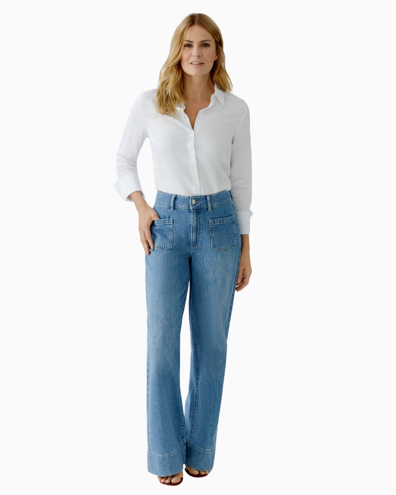 Woman wearing Oui wide-leg blue jeans, full outfit model view – Áines Boutique