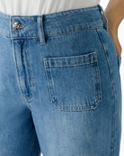 Close-up of Oui blue denim fabric and waistband detail – Áines Boutique