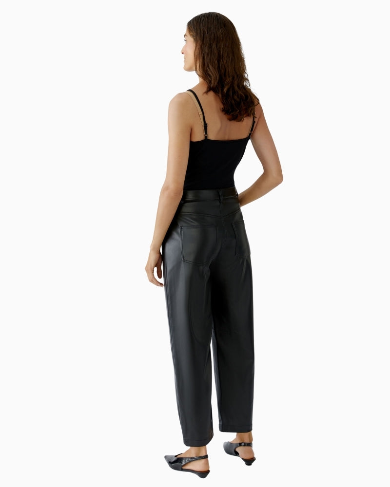 Back view of matte black faux leather trousers with clean finish
