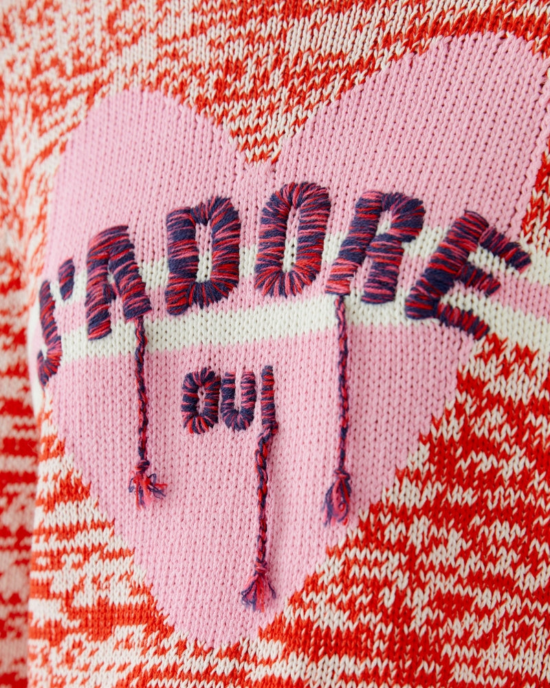 Close-up of J’ADORE detail and knit texture