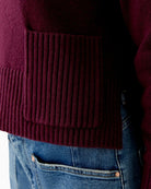 Close-up of ribbed hem with side slit on Oui bramble berry jumper
