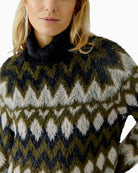Close-up of ribbed neckline and smooth knit texture
