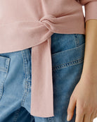 Close-up of Oui pullover knot detail at hem – Áines Boutique