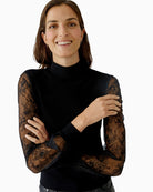 Detail of stand-up collar and soft knit texture