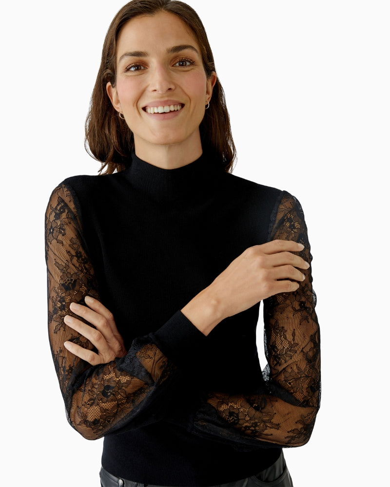 Detail of stand-up collar and soft knit texture