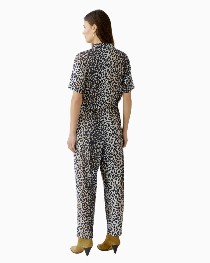 Back view of jumpsuit with all-over print and soft drape