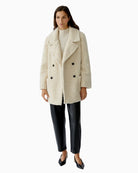 Model profile showing soft drape and easy layering shape