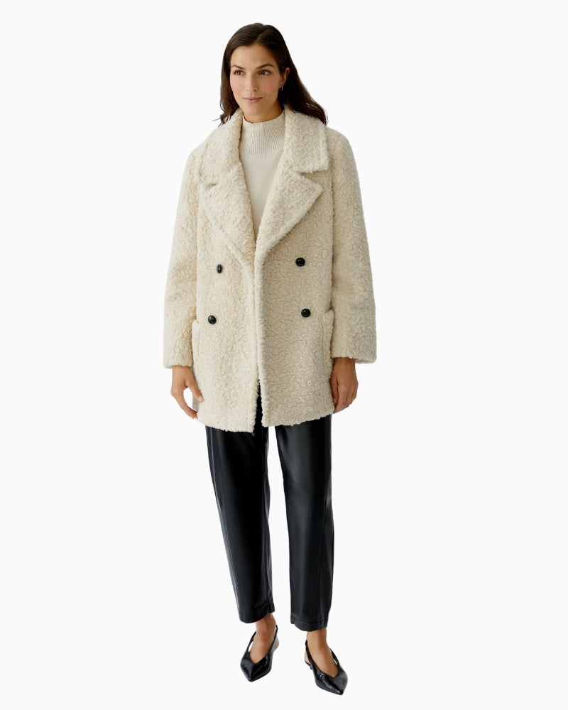 Model profile showing soft drape and easy layering shape