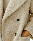 Close-up of smooth polyester fabric and tailored collar