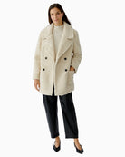 Model profile showing soft drape and easy layering shape