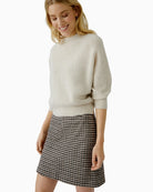 Side view of stretch mini skirt with clean design