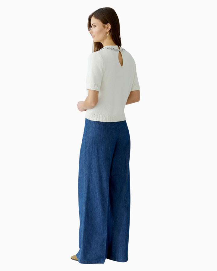 Back of pullover with hook fastening at neck