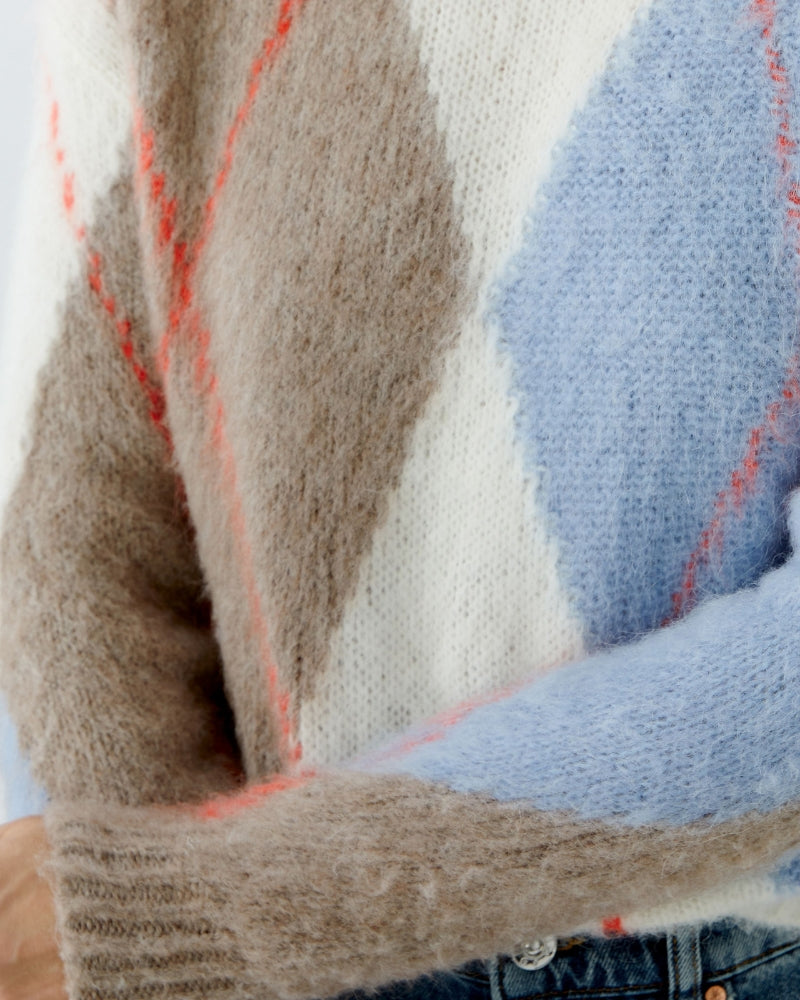 Close-up of soft mixed yarn texture in Oui jumper