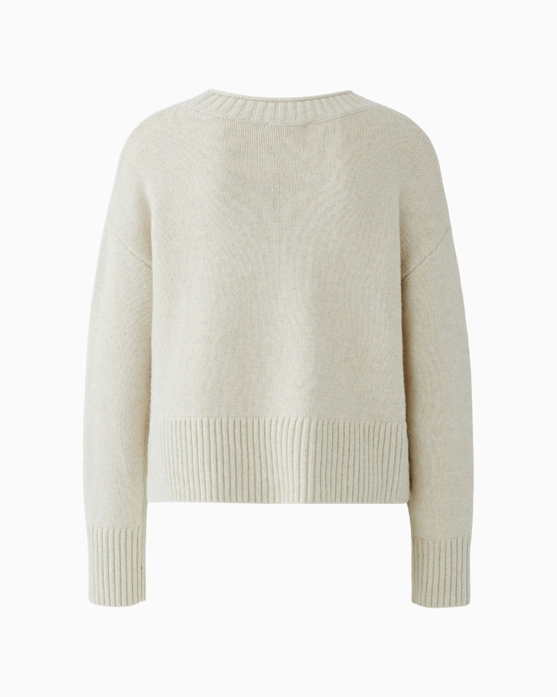 Back view of Oui pullover in light beige showing relaxed fit and long sleeves