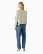 Back view of Oui pullover in light beige showing relaxed fit and long sleeves