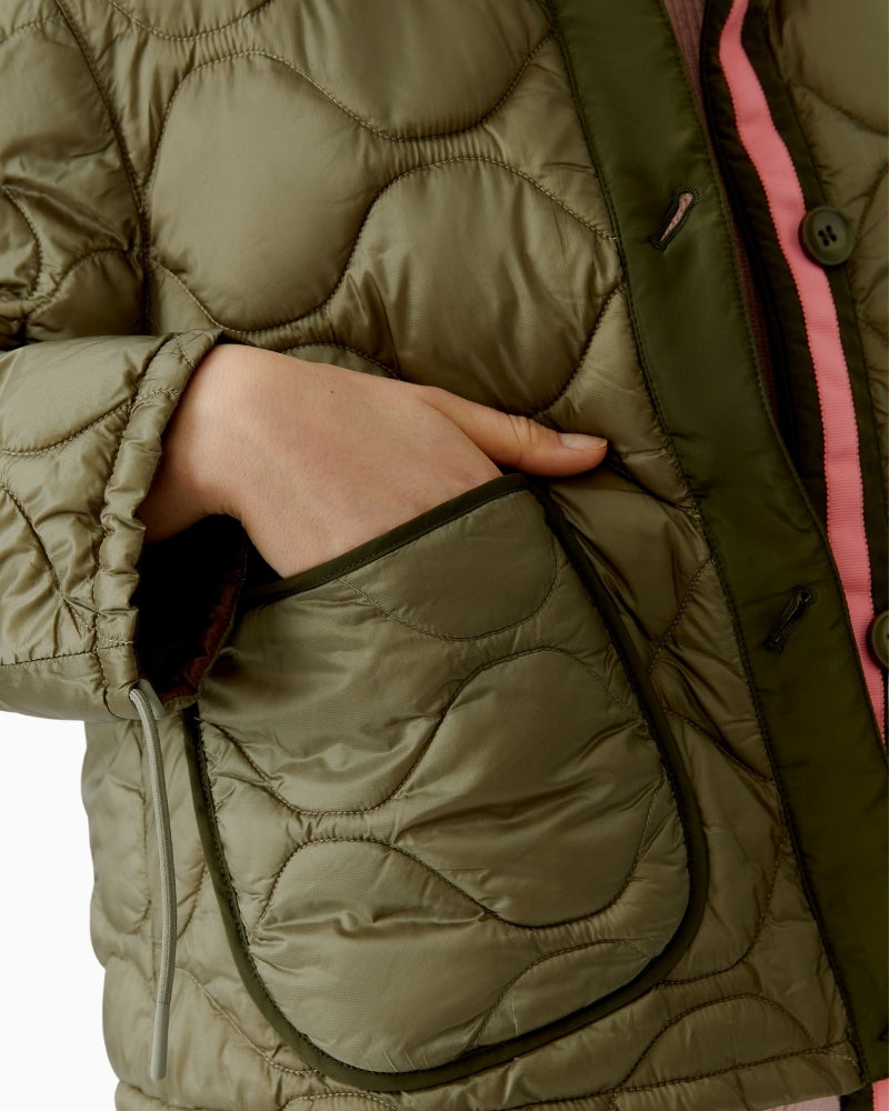Close-up of Oui quilted jacket fabric, padding and cord detail – Áines Boutique