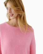 Close-up of alpaca knit fabric in gentle rose tone