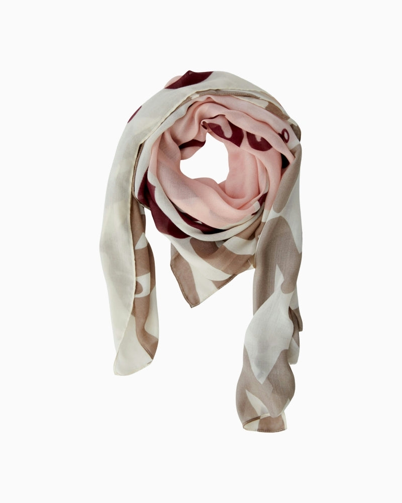 Oui printed scarf in rose red styled as a wrap with bold colour design