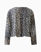 Back view of camel and black animal print blouse by Oui