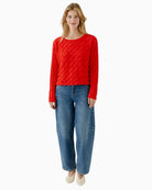 Oui Sirah pullover styled with high-waisted trousers