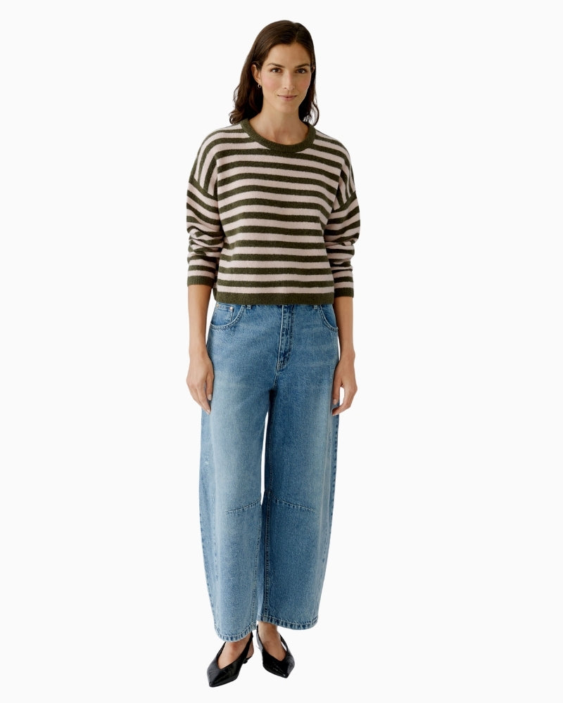 Model view showing cropped length and ribbed hem