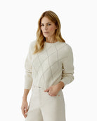Woman wearing Oui gardenia textured knit pullover front view – Áines Boutique