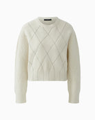 Woman wearing Oui gardenia textured knit pullover front view – Áines Boutique