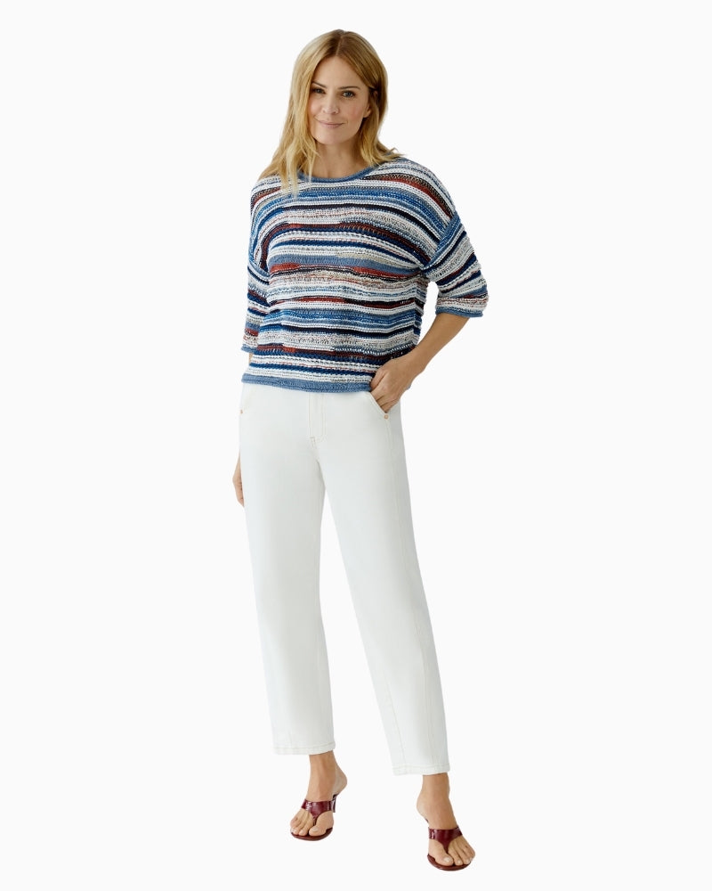 Woman wearing Oui The Relaxed white jeans, styled outfit – Áines Boutique