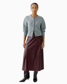 Oui leather-look wrap skirt styled with knit jumper and ankle boots for autumn