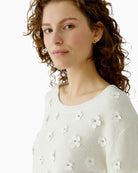 Oui Gardenia pullover sleeve showing applied flower detail – Áines Boutique