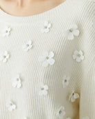 Close-up of Oui pullover floral appliqué with crystal detail – Áines Boutique