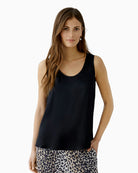 woman wearing Oui A-shape black tank top front view – Áines Boutique