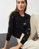 Oui Cardigan in black micro-sequin sleeve detail