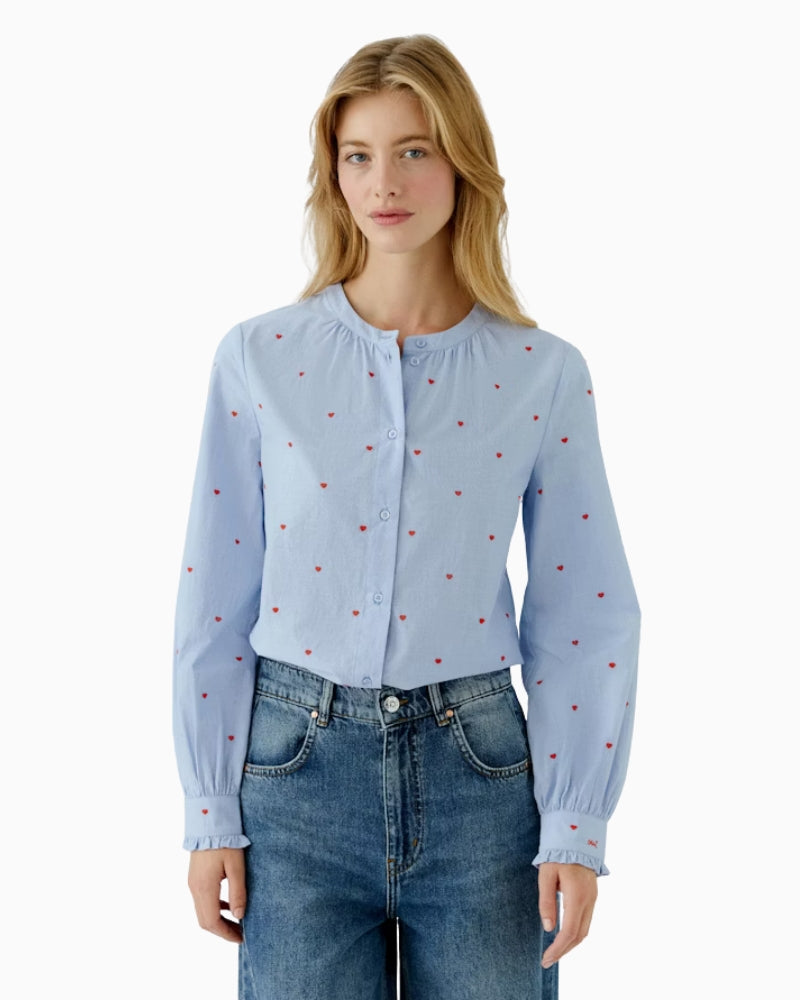 Oui blue cotton blouse with red heart embroidery front view on woman wearing it – Áines Boutique