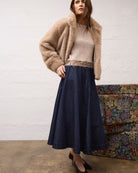 Oui Knit Sweater in Light Beige styled with fur jacket