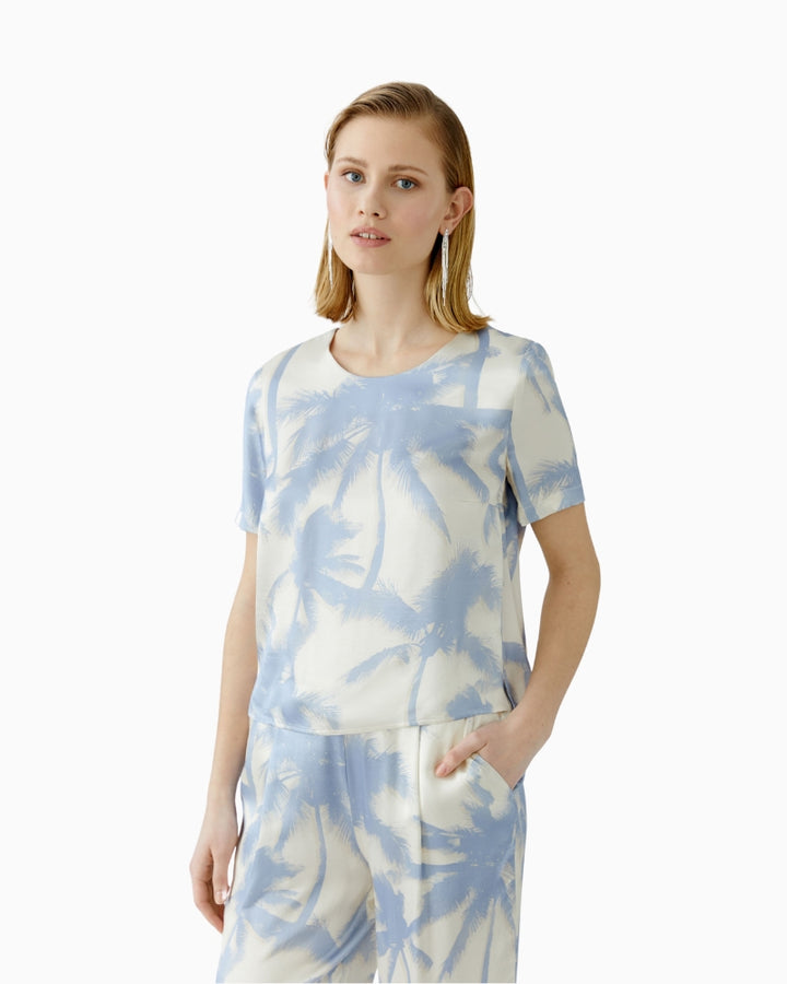 Front view of Oui white and blue print viscose blouse with short sleeves