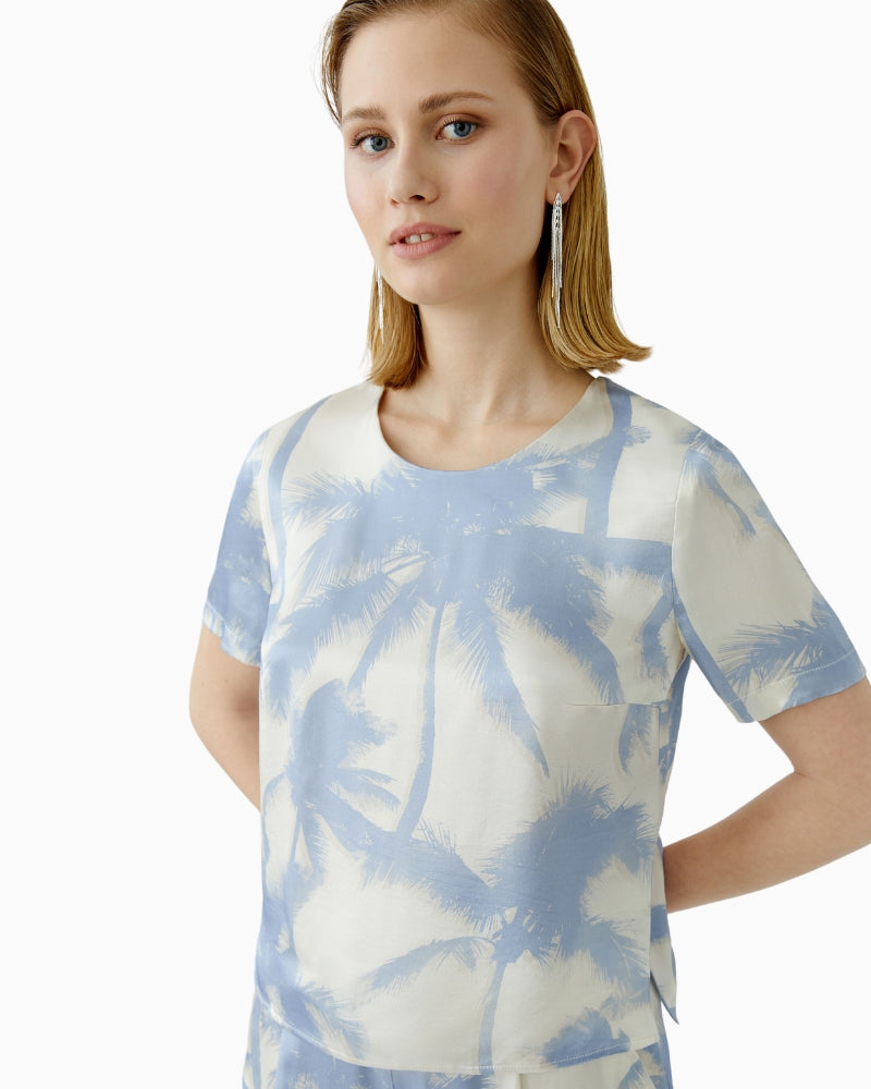 Front view of Oui white and blue print viscose blouse with short sleeves