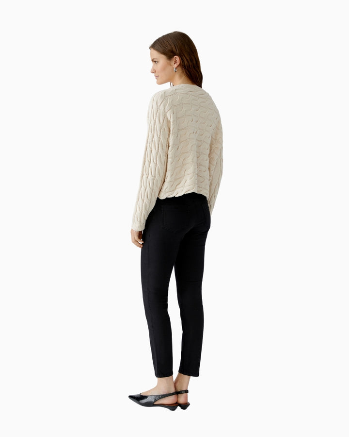 Sleeve hem with ribbed cuff and rolled edge