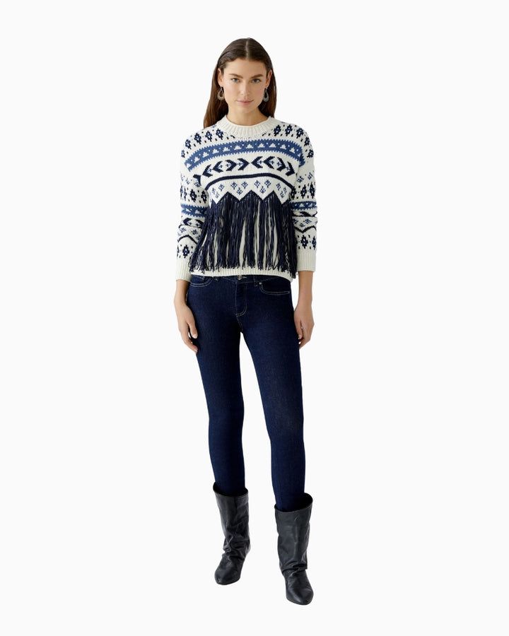 Styled look showing Oui pullover paired with jeans for a relaxed outfit