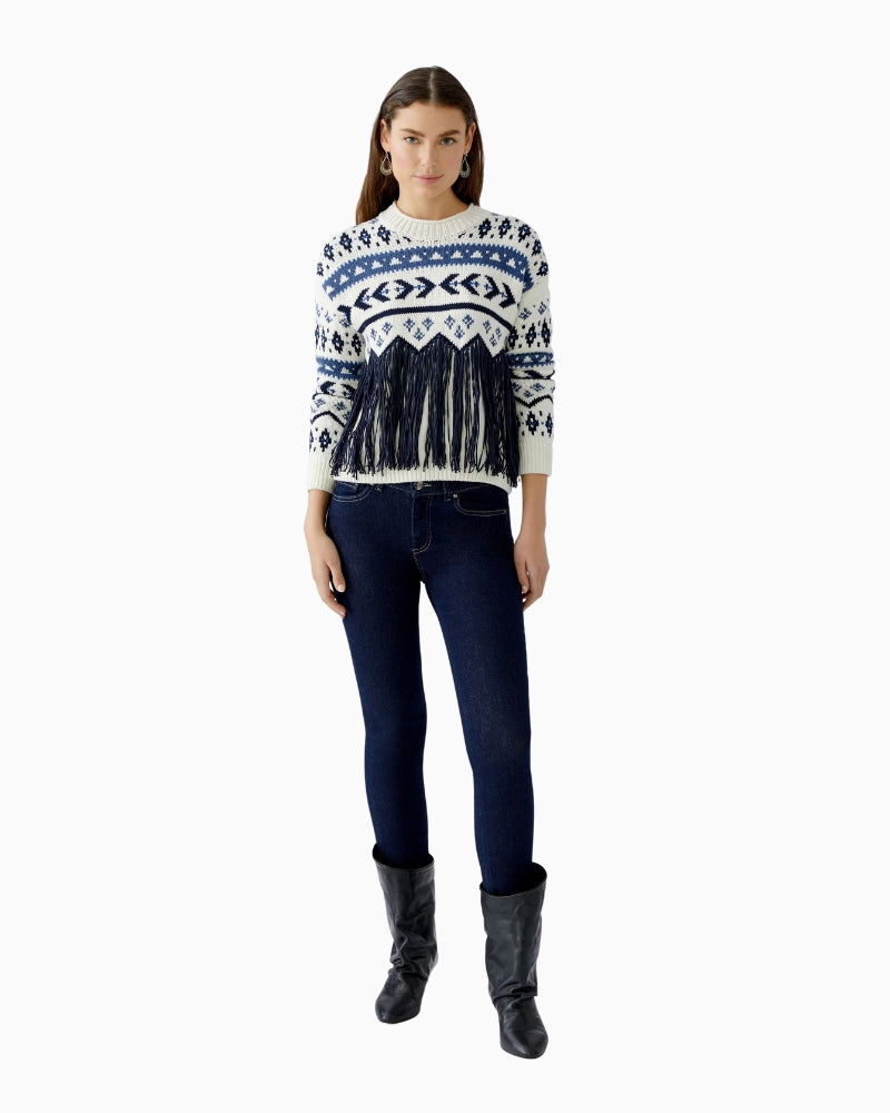 Styled look showing Oui pullover paired with jeans for a relaxed outfit