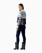Side view showing dropped shoulder and cropped length fit