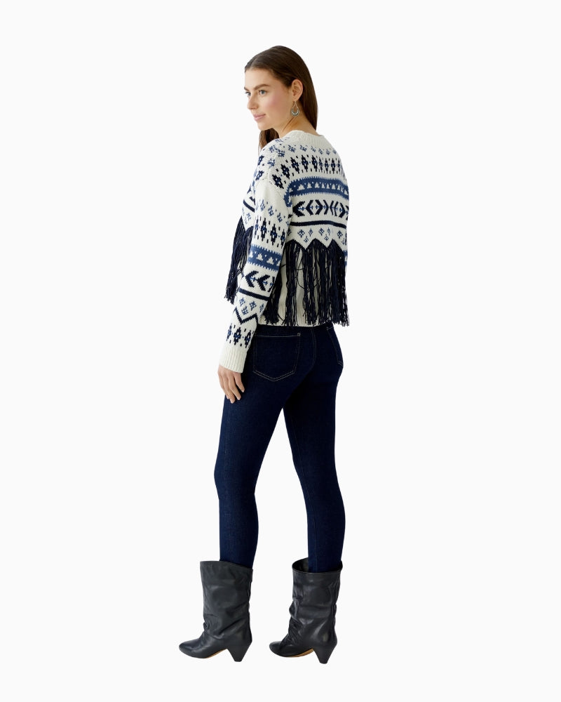 Side view showing dropped shoulder and cropped length fit