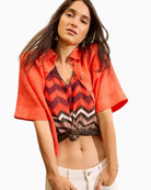 Oui zigzag knit top brown styled with open shirt and light trousers
