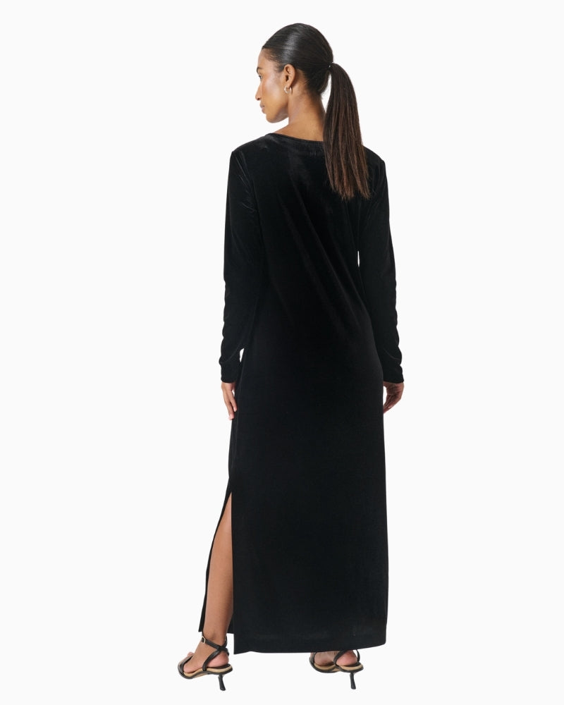 Back view of black dress with clean, simple lines