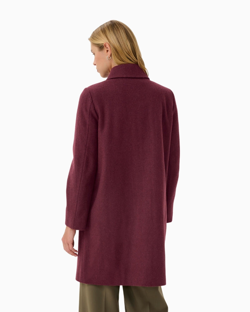 Back view of mid-length port coat with smooth drape