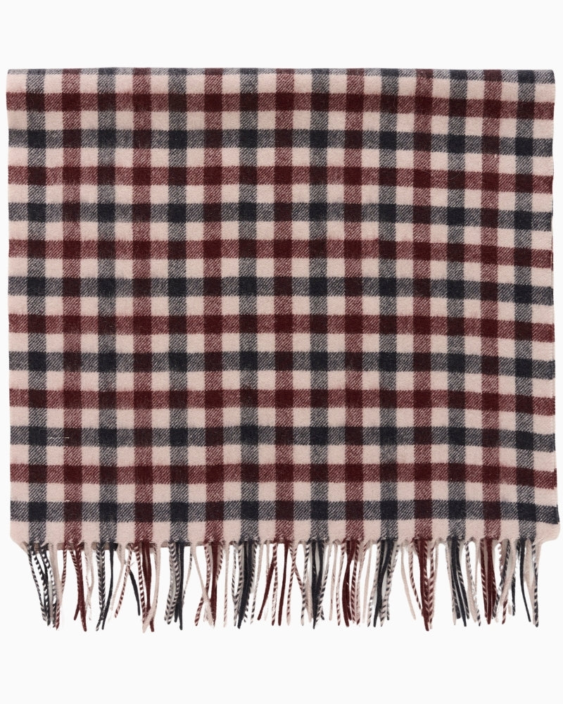 Detail view of soft wool weave in tawny port check
