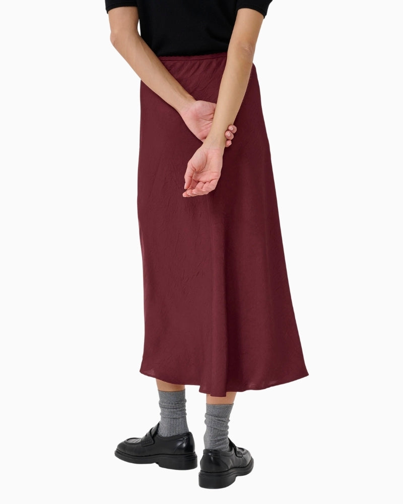 Back view of LaurinaPW skirt showing smooth drape and elastic waistband