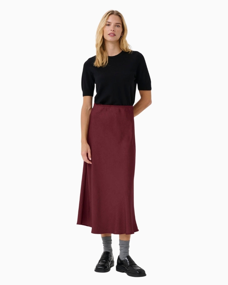 Midi skirt in Tawny Port by Part Two with glossy recycled fabric and A-line shape