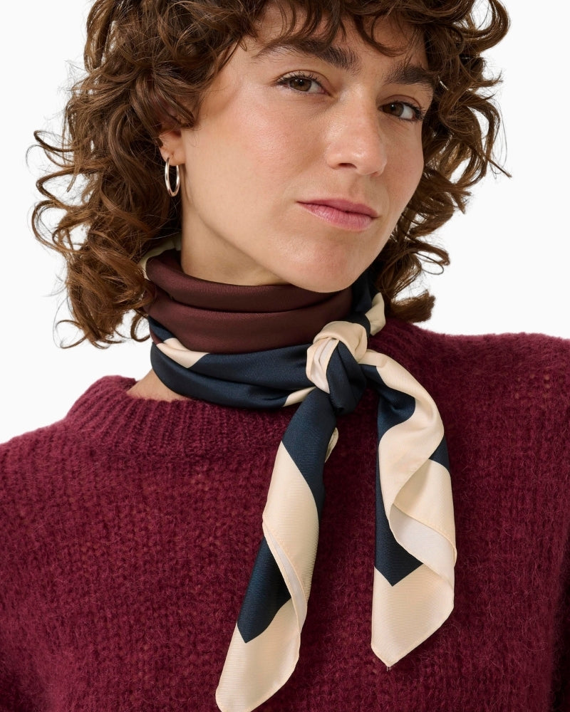 Close-up of NamiraPW scarf showing smooth texture and elegant colour combo