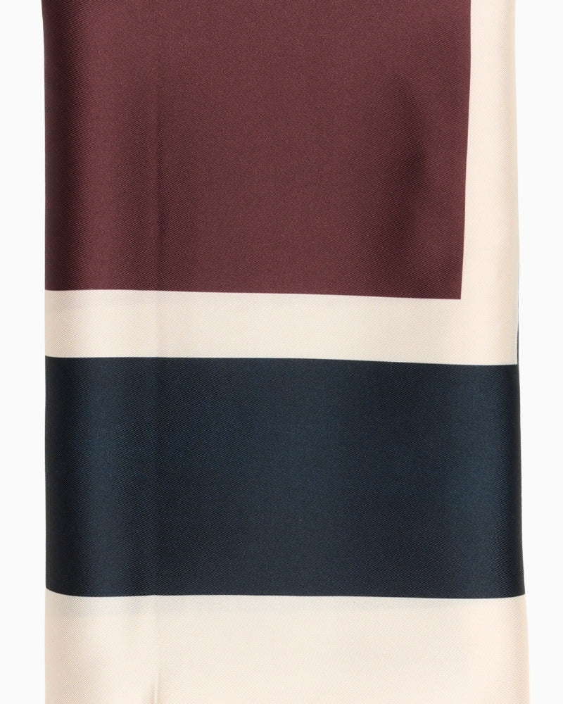 Close-up of NamiraPW scarf showing smooth texture and elegant colour combo